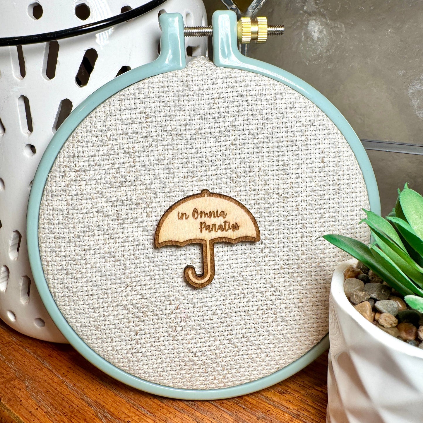 Charming "In Omnia Paratus" Needle Minder