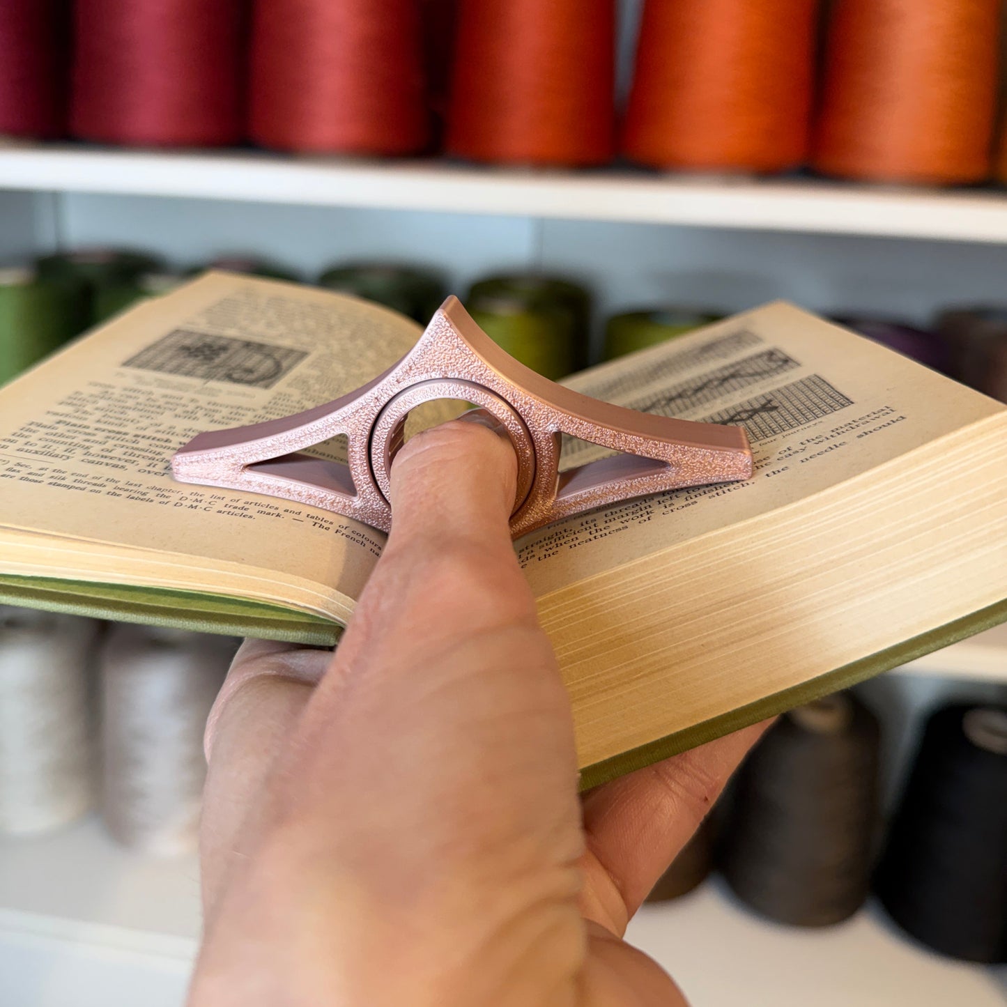 Rotating Thumb Page Holder for Comfortable Reading