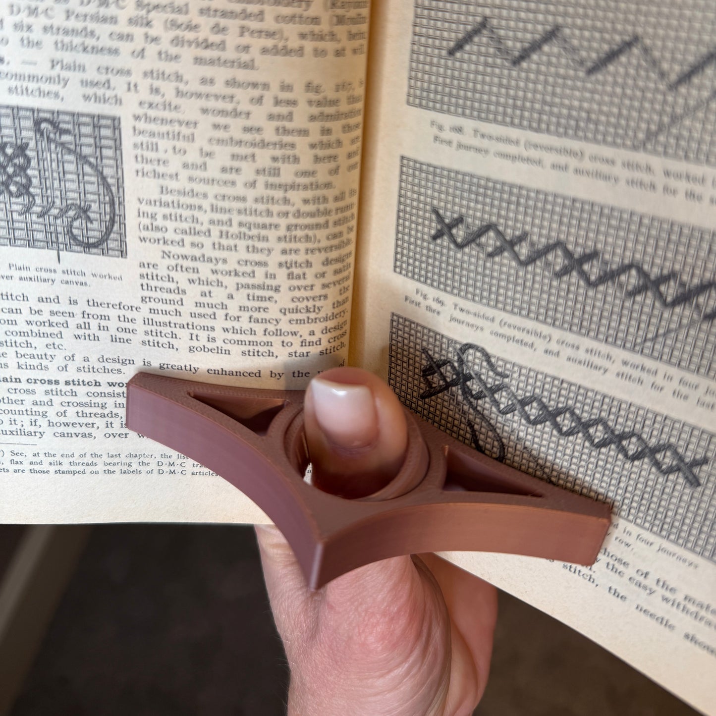 Rotating Thumb Page Holder for Comfortable Reading